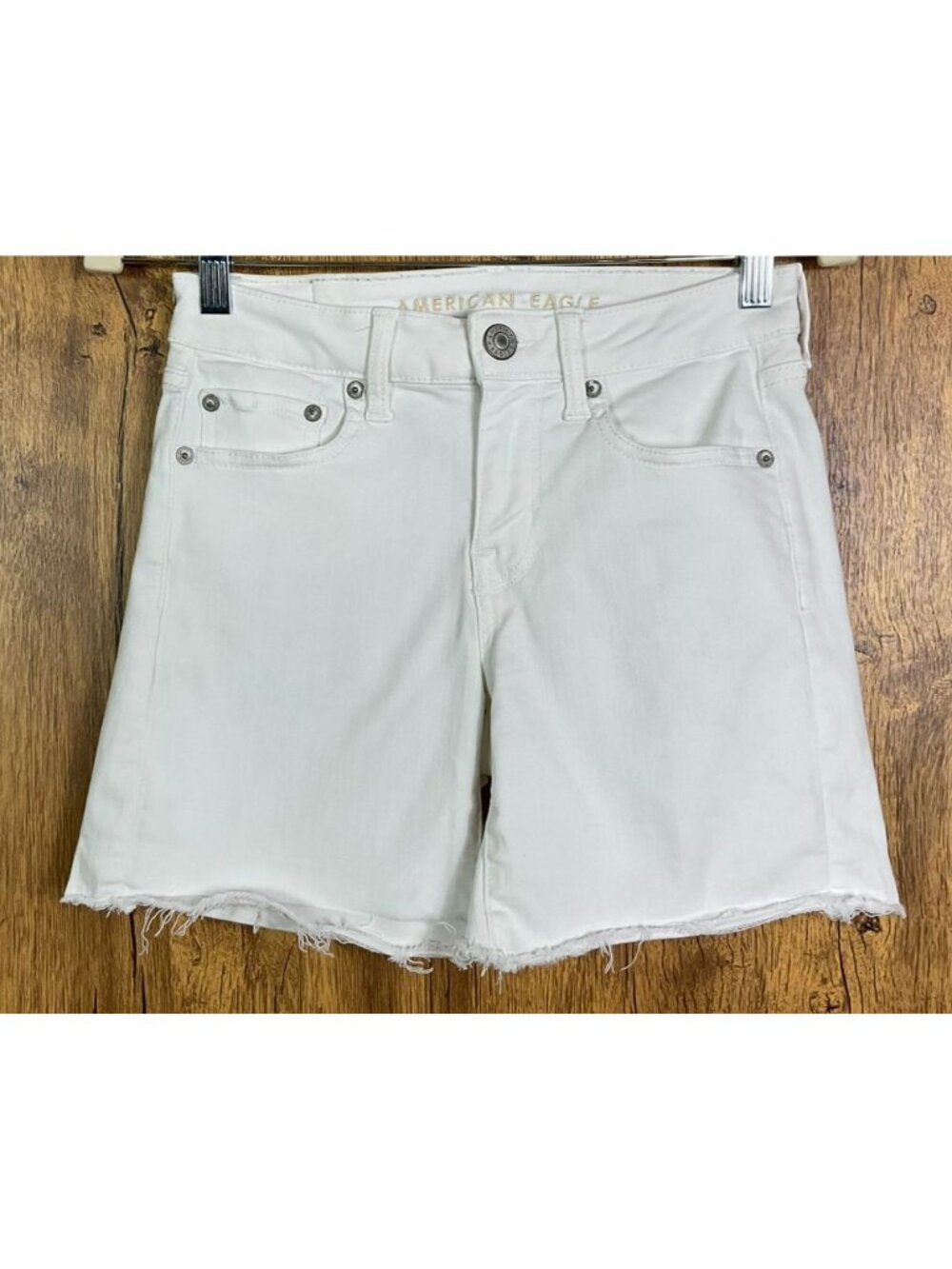 American Eagle Next Level Stretch White Denim Midi Shorts Size 4 Frayed Hem High